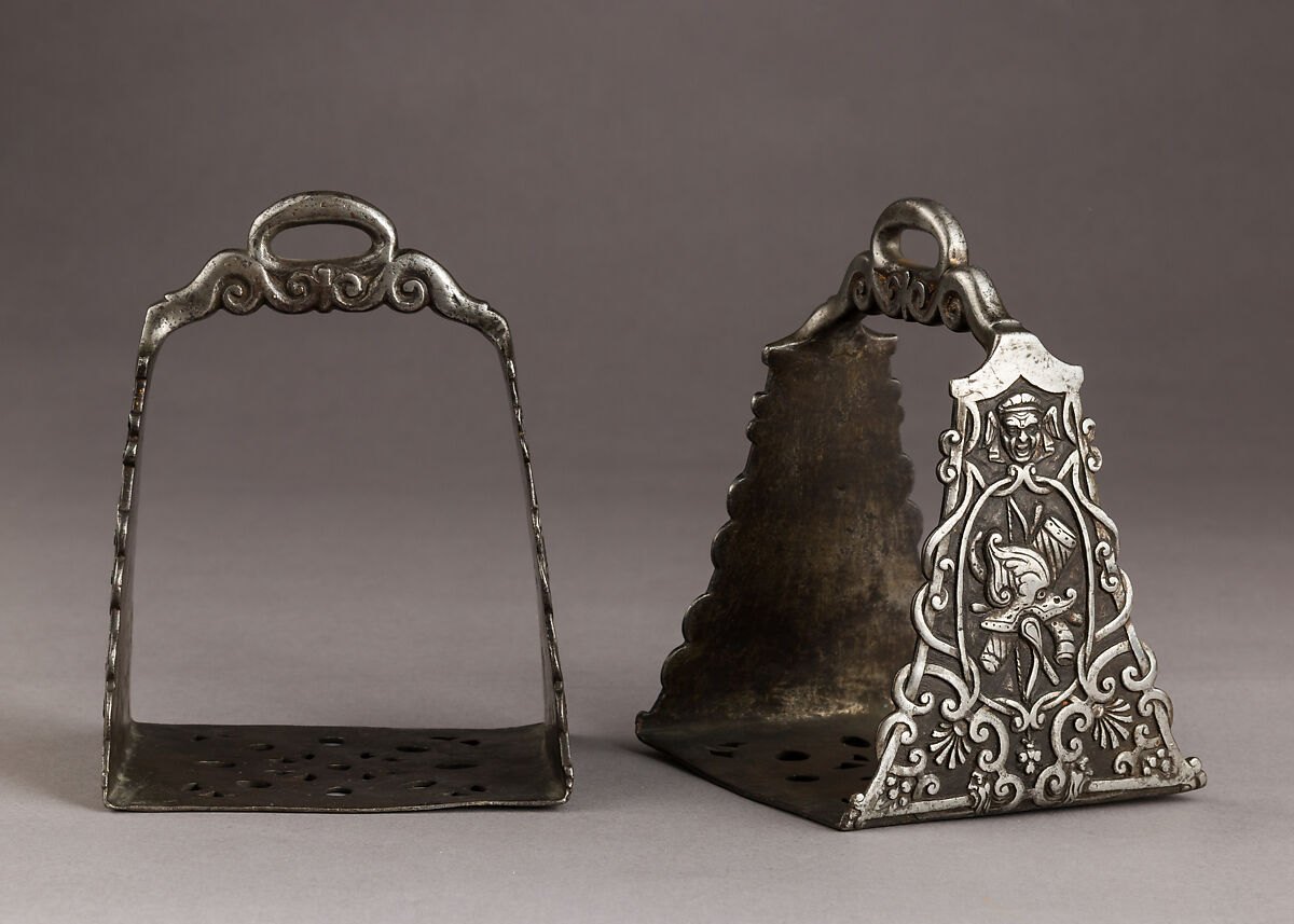 Pair of broad gilded Italian stirrups made around 1600 in a style influenced by Islamic equestrian equipment